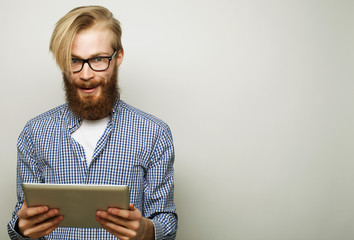 young man  using a tablet computer