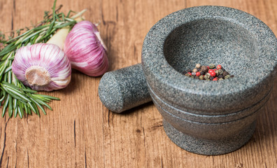Mortar and pestle with pepper and spices