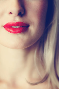 red lipstick on her lips