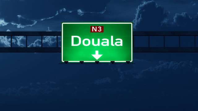 Douala Cameroon Highway Road Sign at Night
