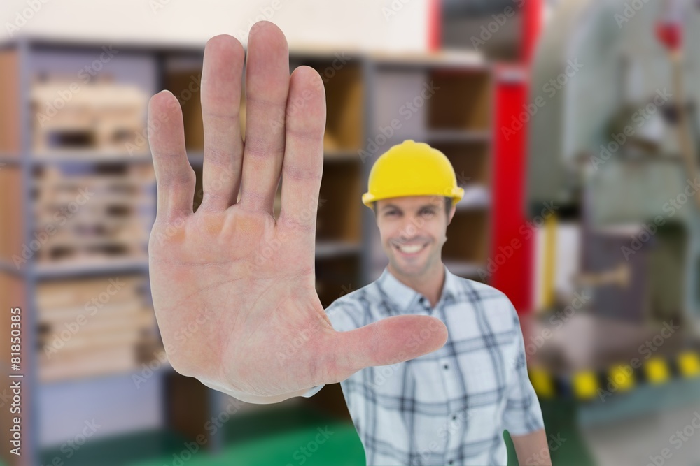 Poster Composite image of carpenter showing palm over white background