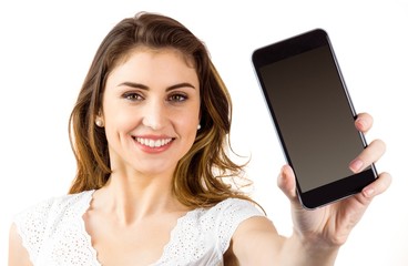 Pretty brunette showing smartphone