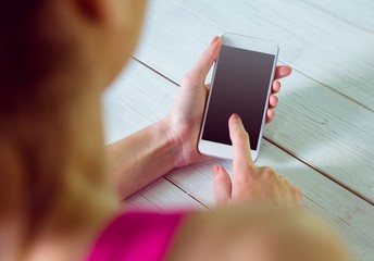 Casual woman using her smartphone