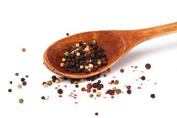 Wooden spoon and dried pepper seeds