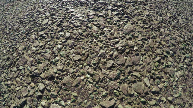 Road surface with stones
