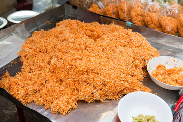 wok noodles at street market