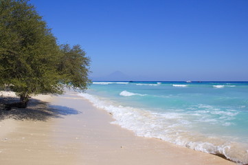 Exotic white Coral sandy beach on Gili Islands, Indonesia
