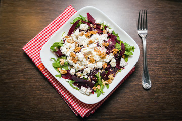 beet salad with arugula, feta and walnut