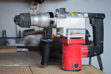 Electric well used power drill, close up with copy space