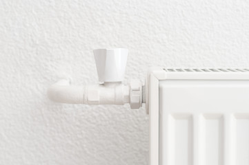 Heating radiator in an apartment. Detail shot with copy space