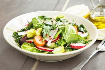 Vegetables Salad Dish with Fresh Organic Lettuce,Radish, Carrots