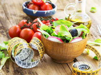 Healthy Vegetables Salad with Measure Tape.Diet Concept