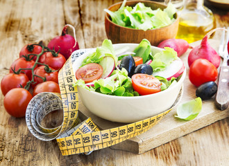 Vegetables Salad with Measure Tape.Healthy Diet Concept