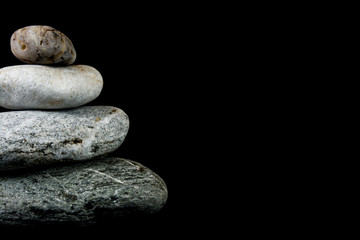 Stones on black background