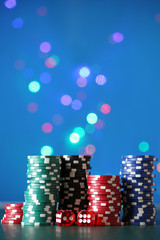 Chips for poker on shiny background