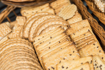 Cracker Biscuits In Wood Basket Close Up