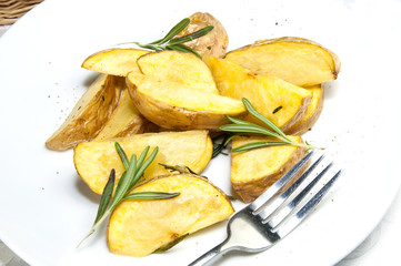 fried potatoes on a plate in a restaurant
