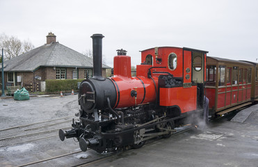 Vintage narrow gauge steam engine in use on passenger service