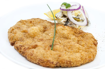 Schnitzel vegetable salad at restaurant