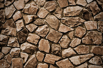 background stone wall beige color close up