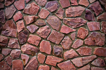 background stone wall pink color close up