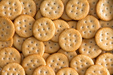 Salted Baked Round Crackers for Backgrounds - obrazy, fototapety, plakaty