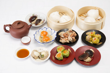 Group of stream Dim Sum chinese food and hot Tea