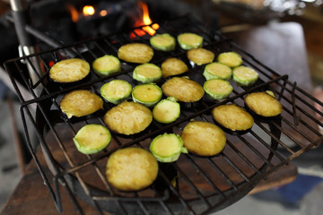 Raw eggplant on the grill