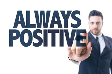 Business man pointing the text: Always Positive