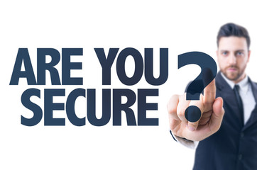 Business man pointing the text: Are You Secure?