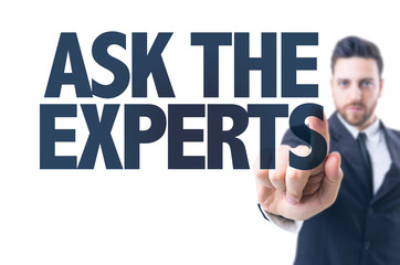 Business man pointing the text: Ask the Experts