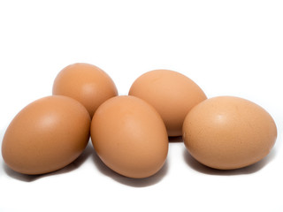 Five eggs on white background
