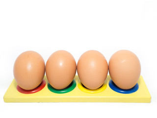 Four Eggs on Coloured Holes