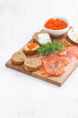 appetizers - salted salmon, red caviar, toast and cream cheese