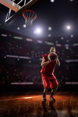 red Basketball player in action