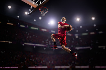 red Basketball player in action