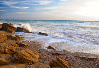 Rocky shore on sea. Summer's seascape