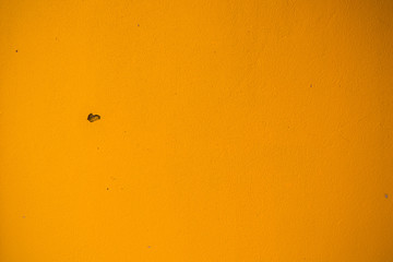 textured yellow sun wall background