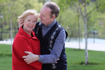 Fototapeta premium Portrait of a happy mature couple outdoors