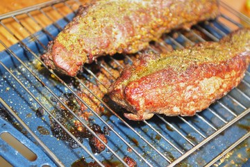 Grilled beef steak on the grilling pan