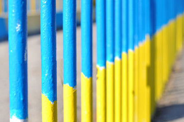 yellow blue metall fence