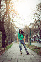 Girl roller skating in park