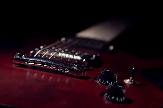 Electric guitar close up on dark background
