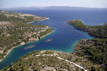 Obraz premium Fish farming in bay on island Brac in Croatia