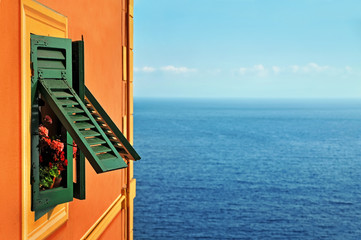 sea background with window shutters