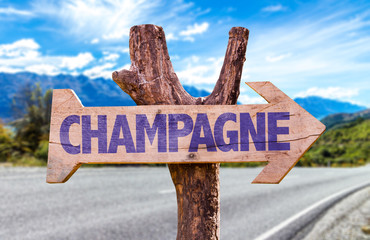 Champagne wooden sign with road background