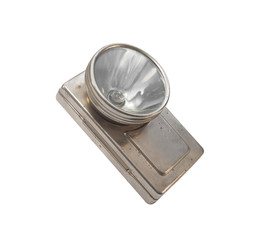 Isolated photo of vintage and antique old soviet flashlight on white background.