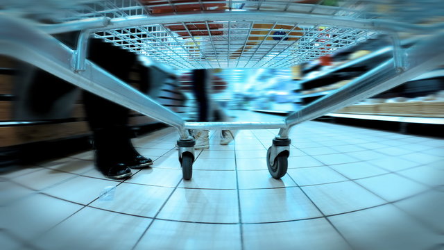 HD 4K Aaccelerated video of a trolley rolling around the market