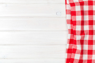 Fototapeta premium Red towel over wooden kitchen table