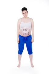 Pregnant women with printed words on her stomach